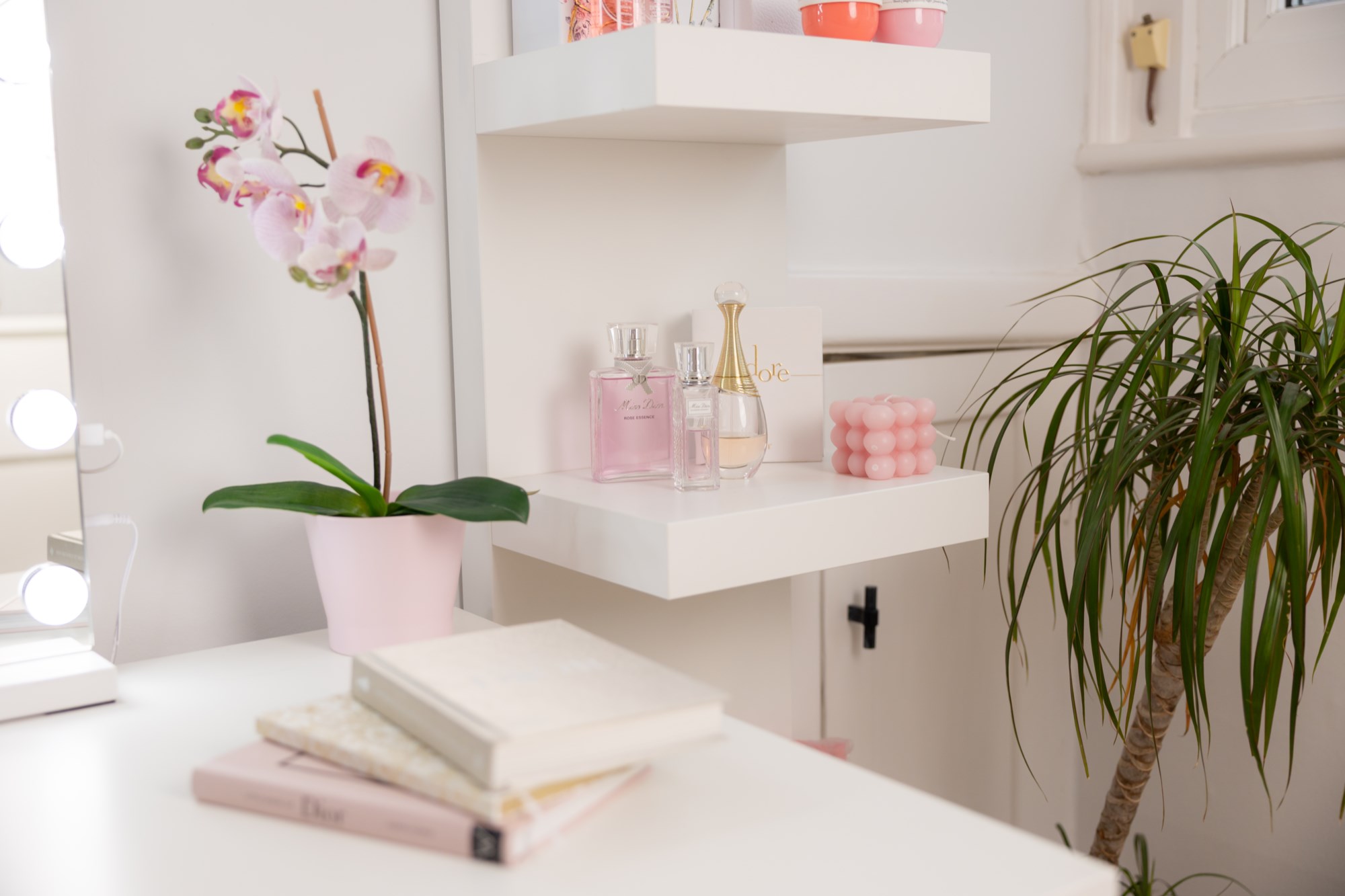 Beautiful dressing table with perfumes and orchid