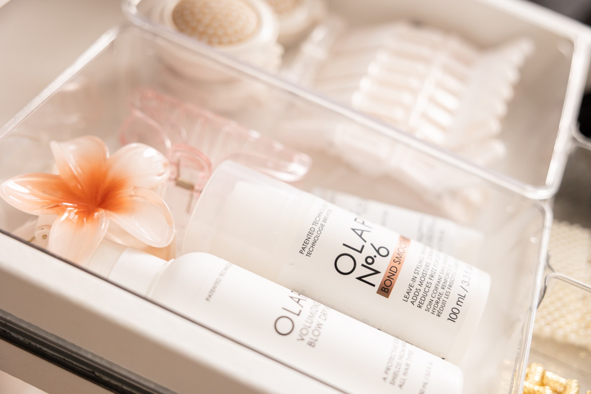 Organised bathroom products in clear containers