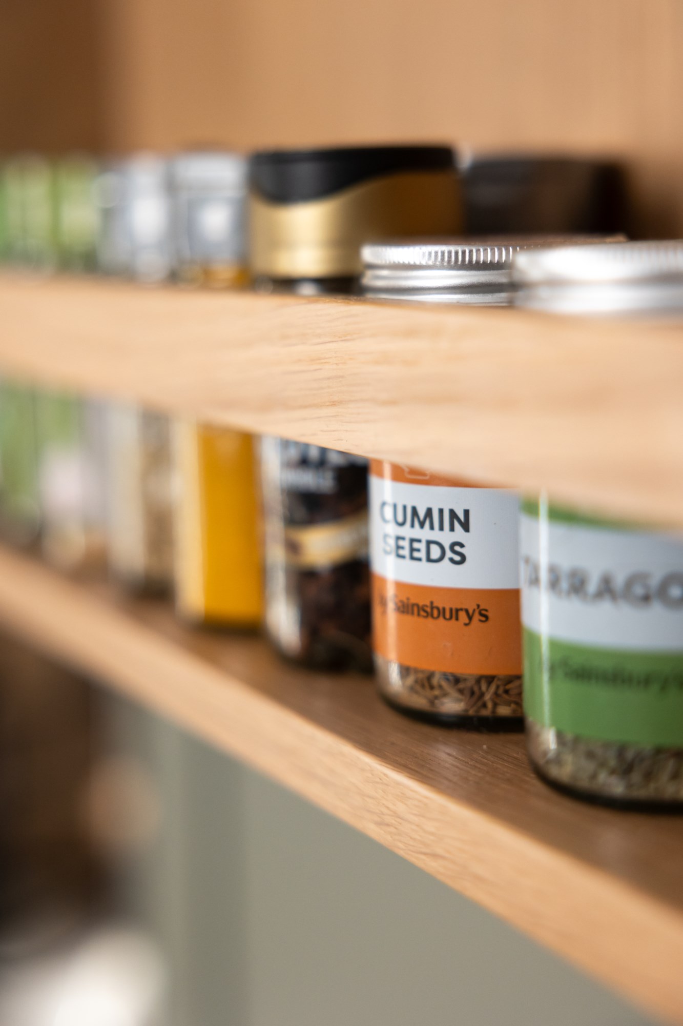 Organised spice shelf close-up